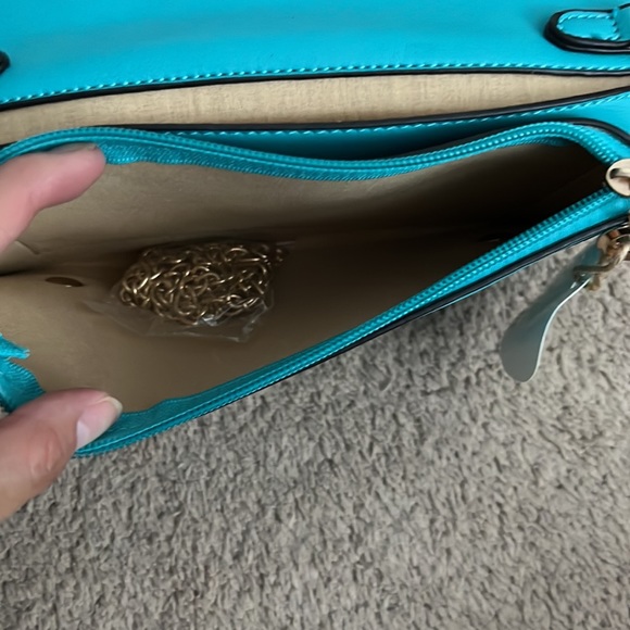 Never used turquoise clutch. - Picture 3 of 5